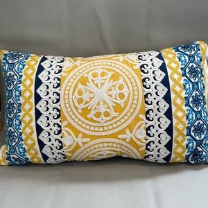 Blue, yellow, and cream lumbar pillow